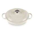 Meringue enameled cast iron cookware with lid on a white background
