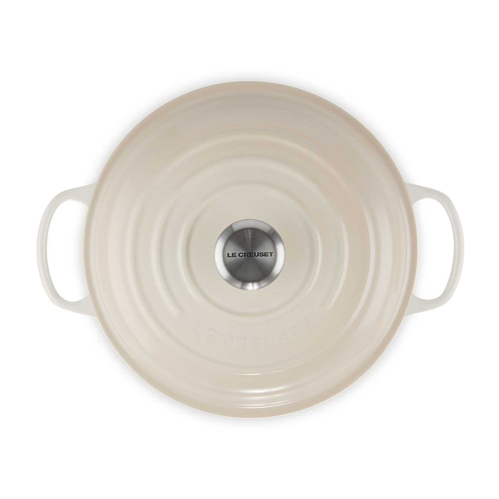 Meringue round lid with handles on a white background, featuring Le Creuset logo.
