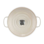 Meringue round lid with handles on a white background, featuring Le Creuset logo.