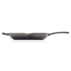 Black grillit pan on a white background