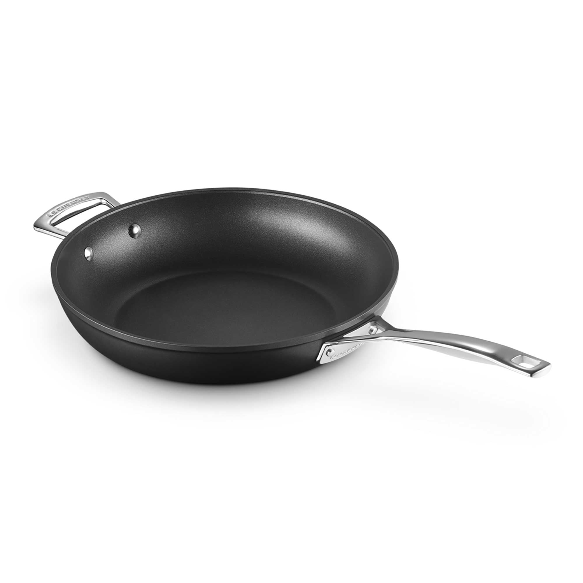 Black deep frying pan on a white background