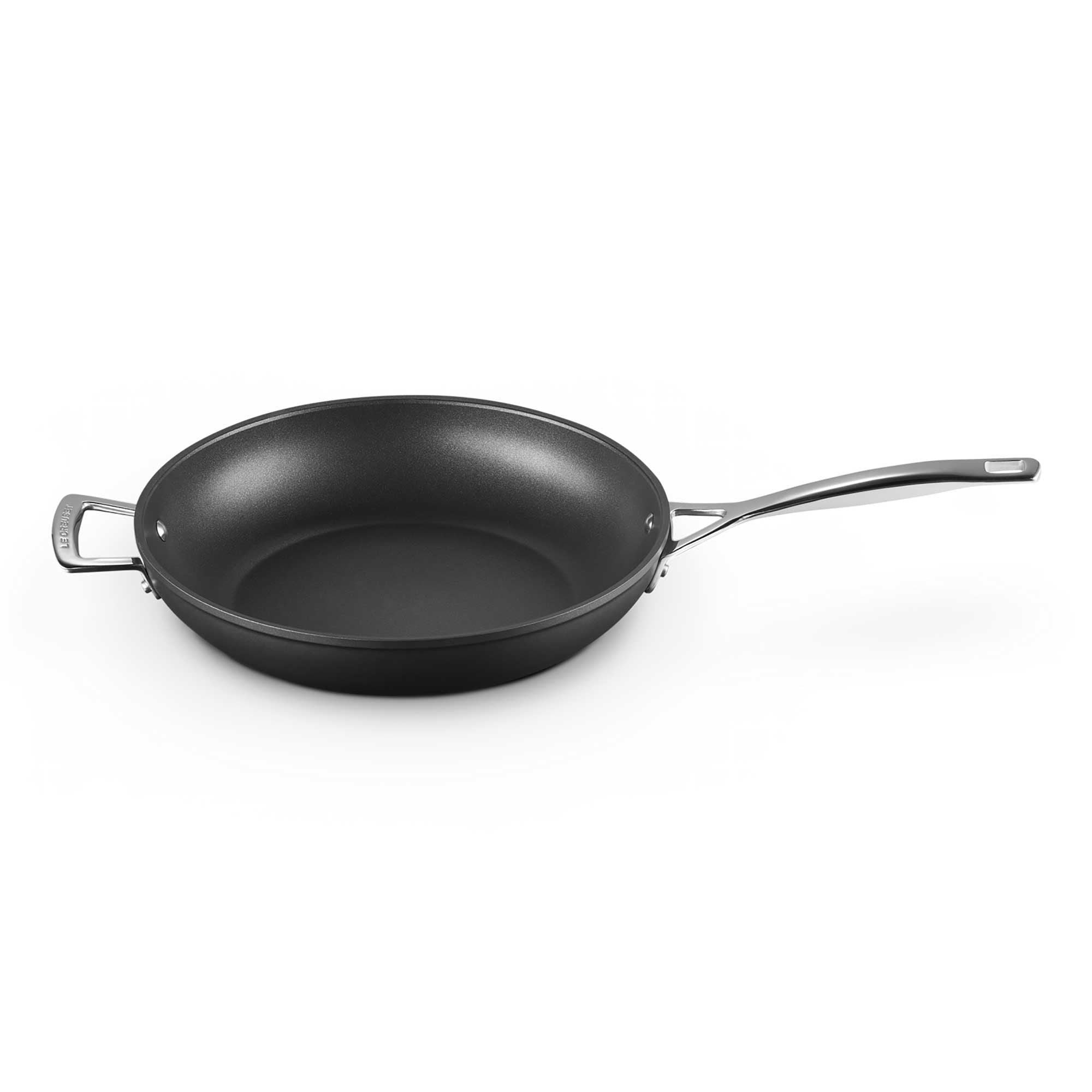 Black deep frying pan on a white background