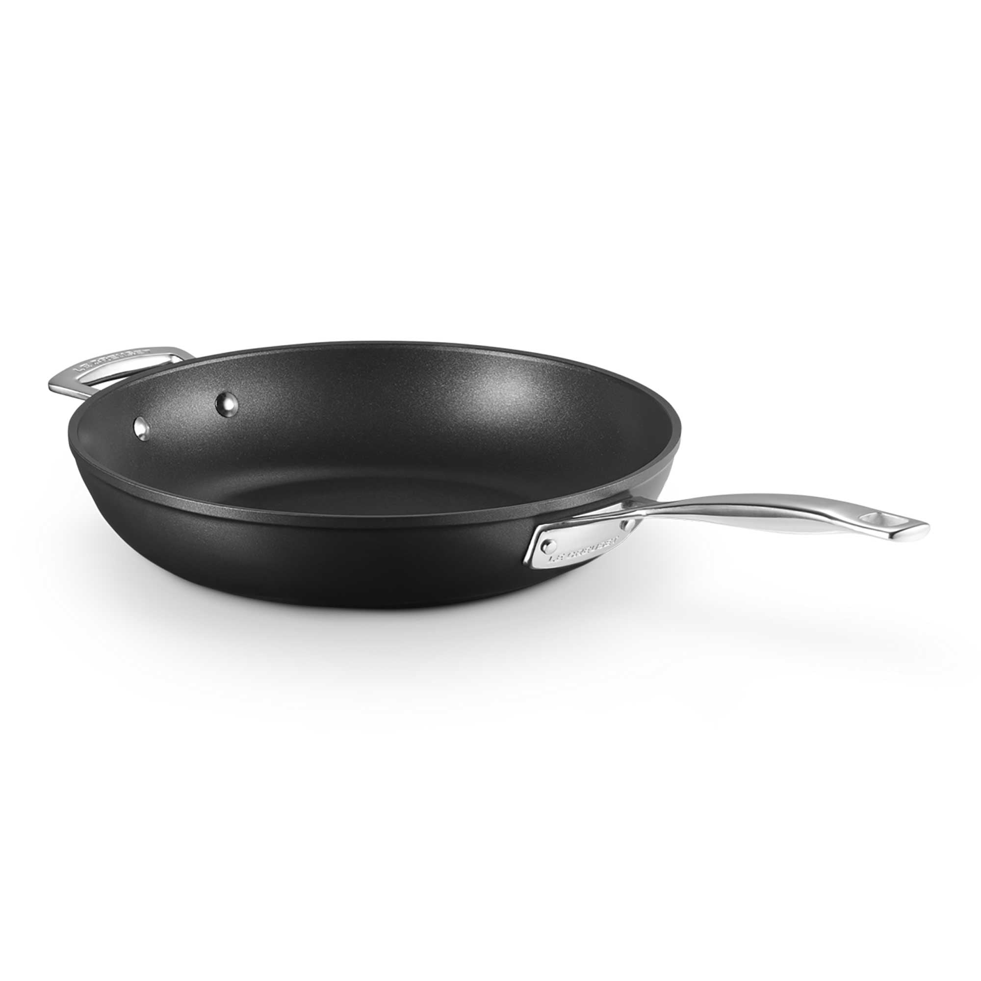 Black deep frying pan on a white background