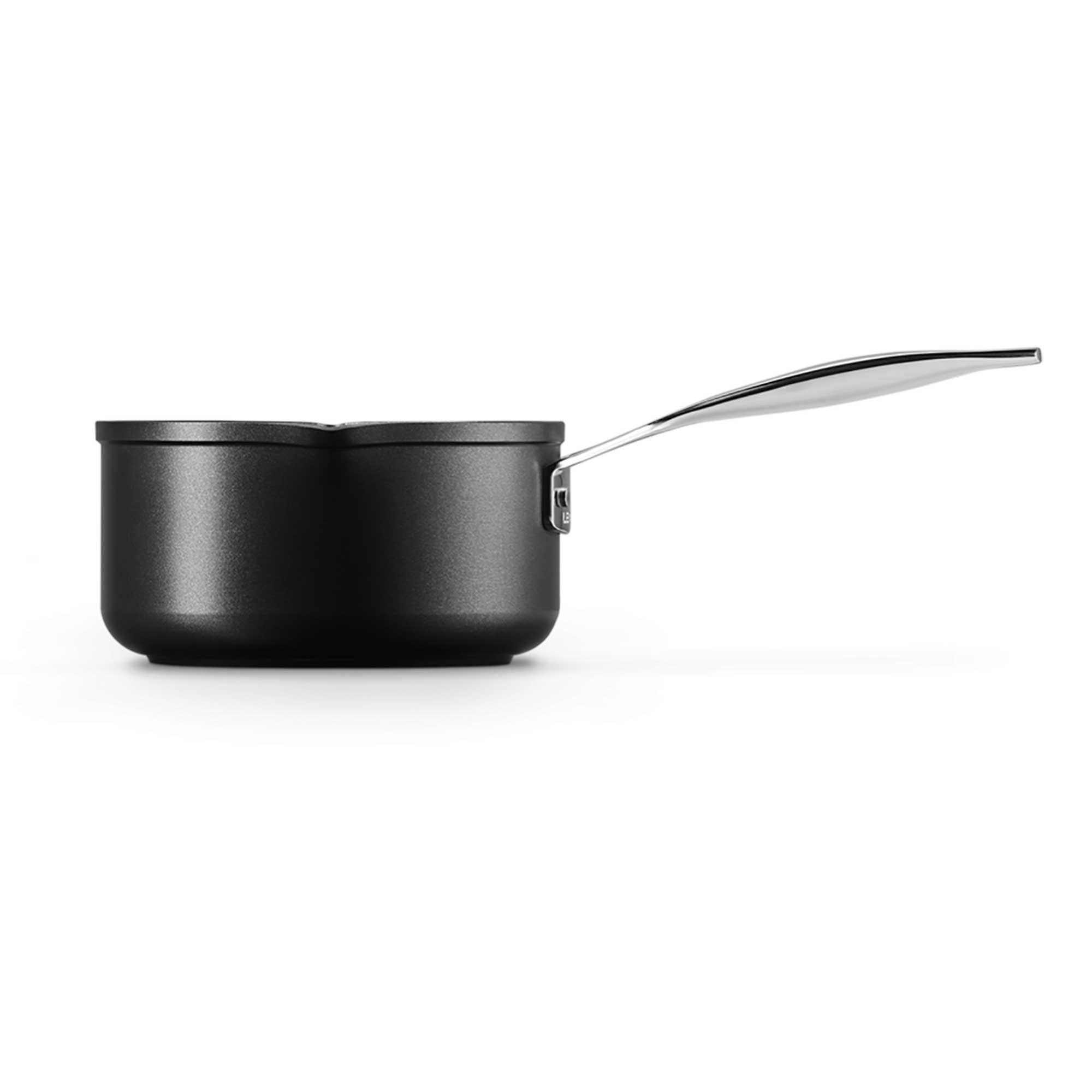 Black milk pan on a white background