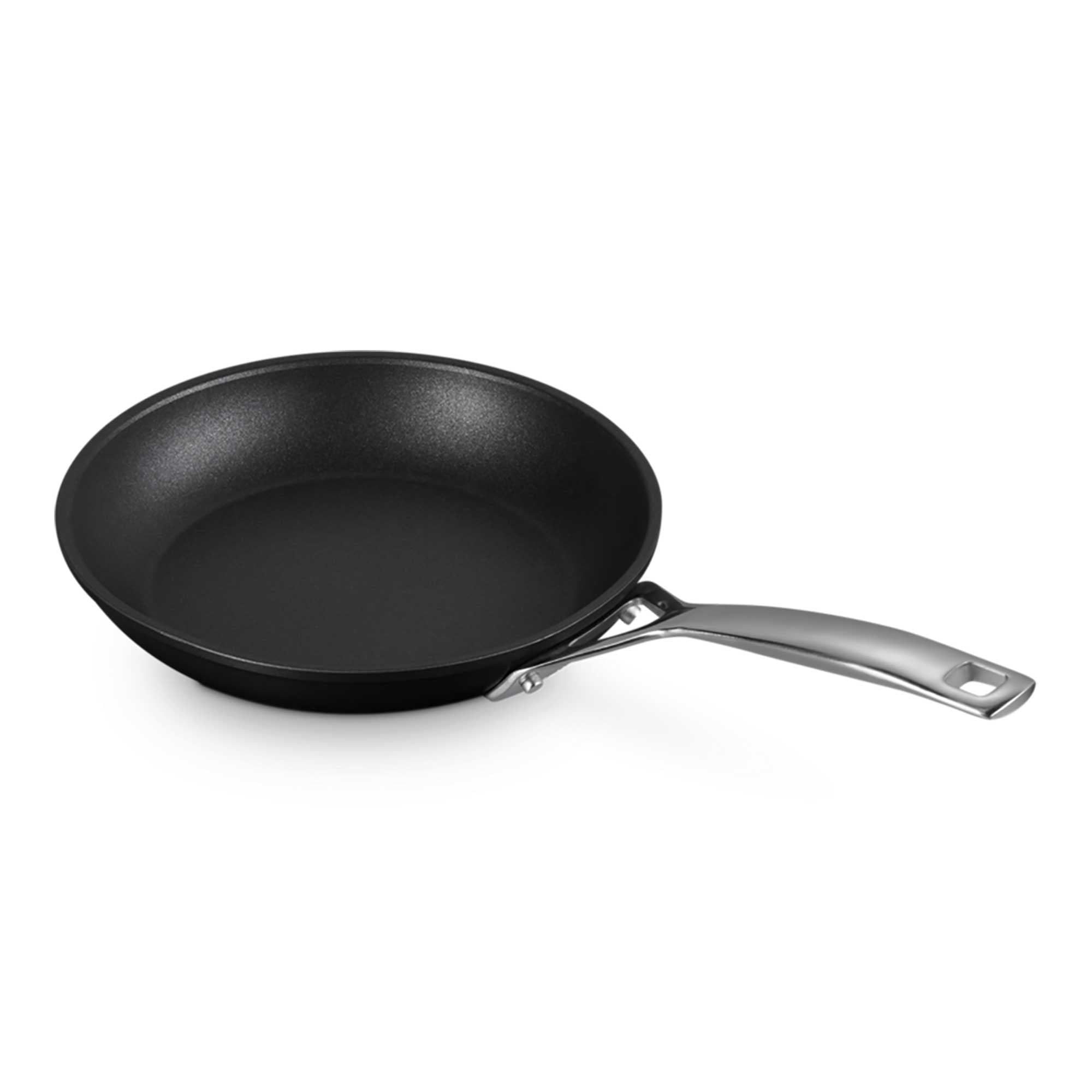 Black frying pan with a silver handle on a white background