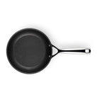 Black frying pan on a white background