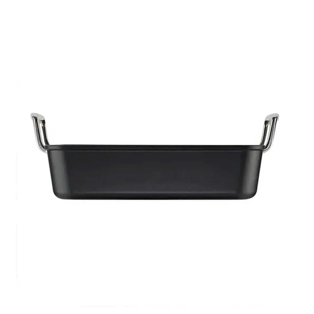 Black square roasting pan with silver handles on a white background