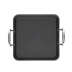 Black square roasting pan with handles on a white background
