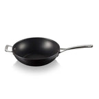 Black stir fry pan with a silver handle on a white background