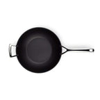 Black frying pan on a white background