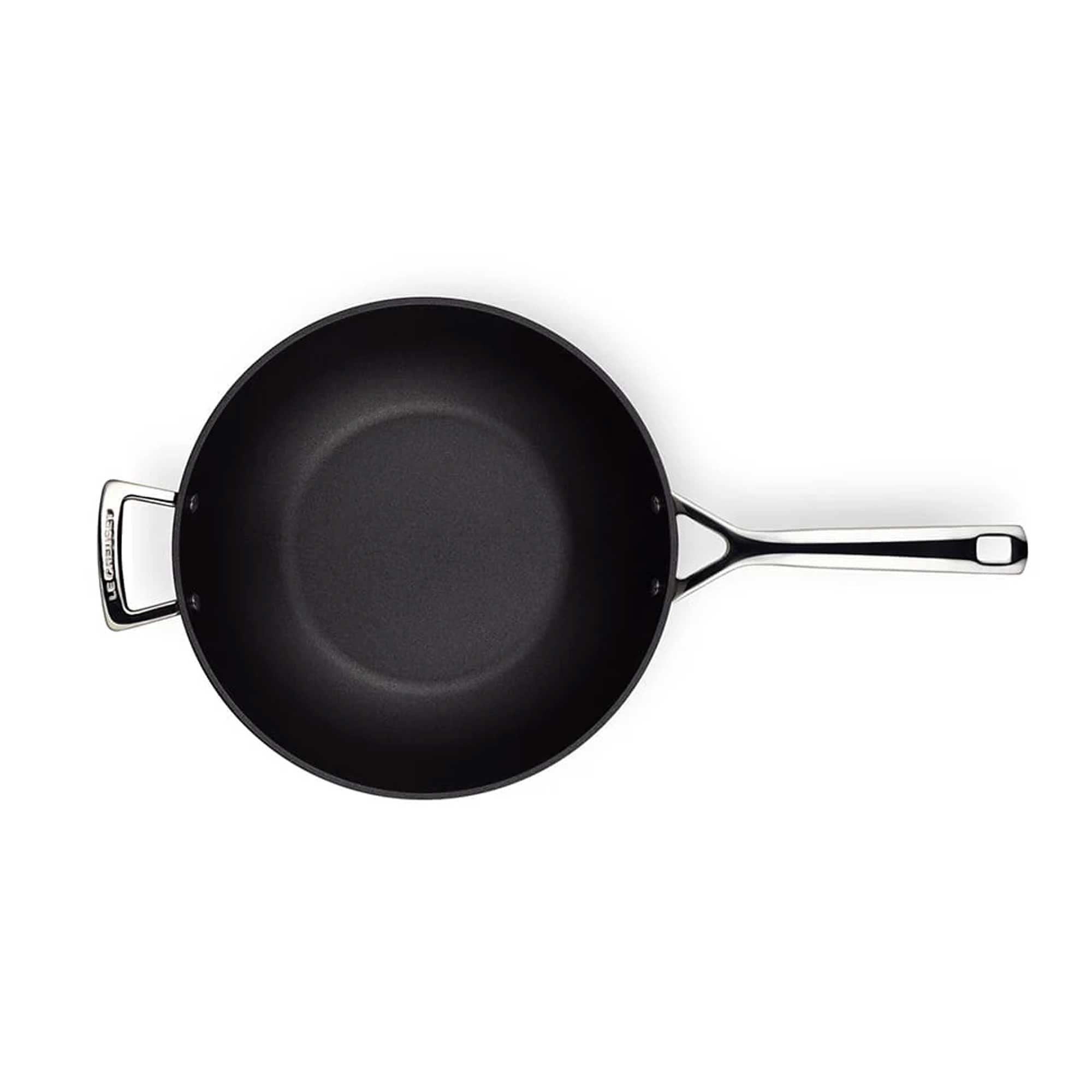 Black frying pan on a white background