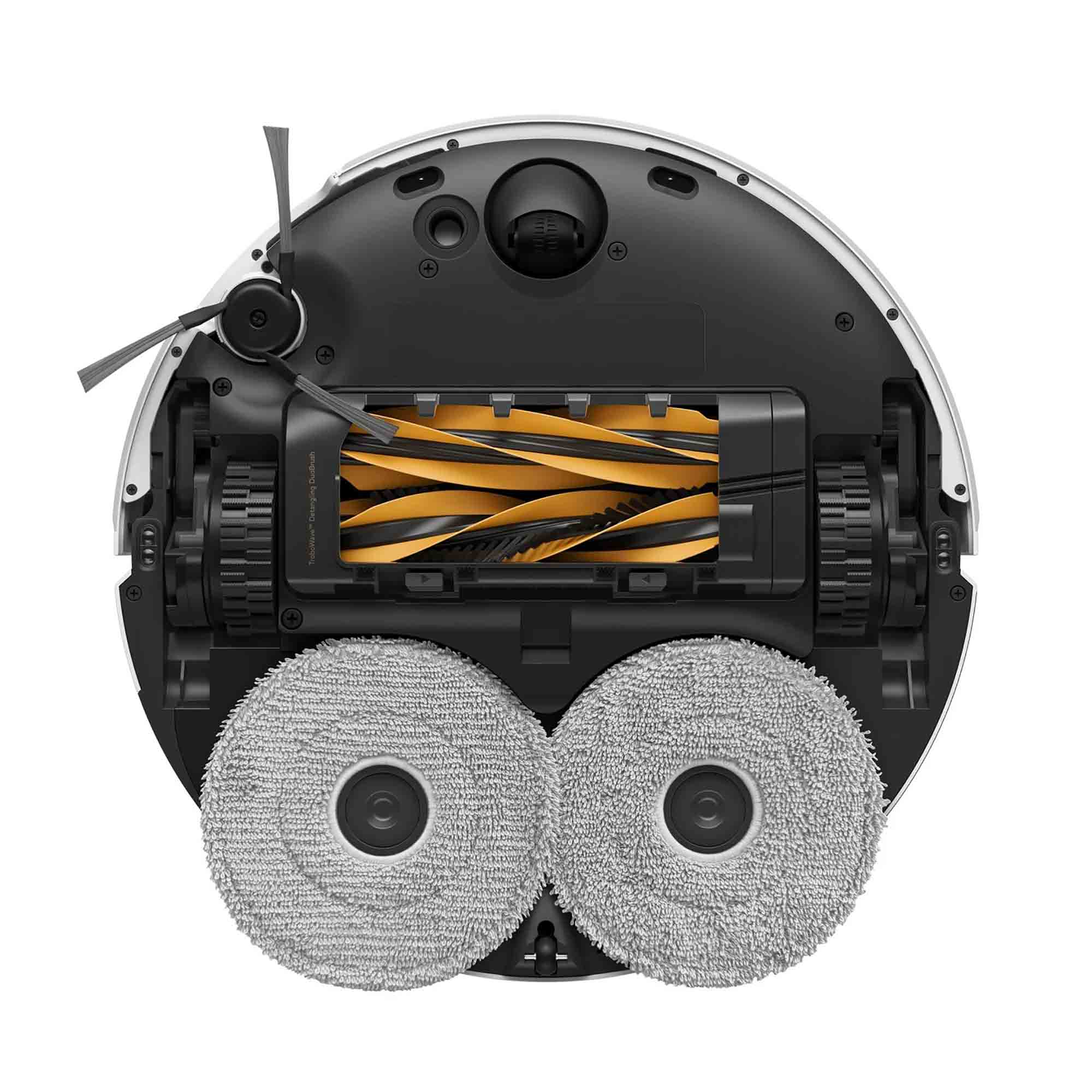 Close-up of a robotic vacuum cleaner's cleaning mechanism on a white background