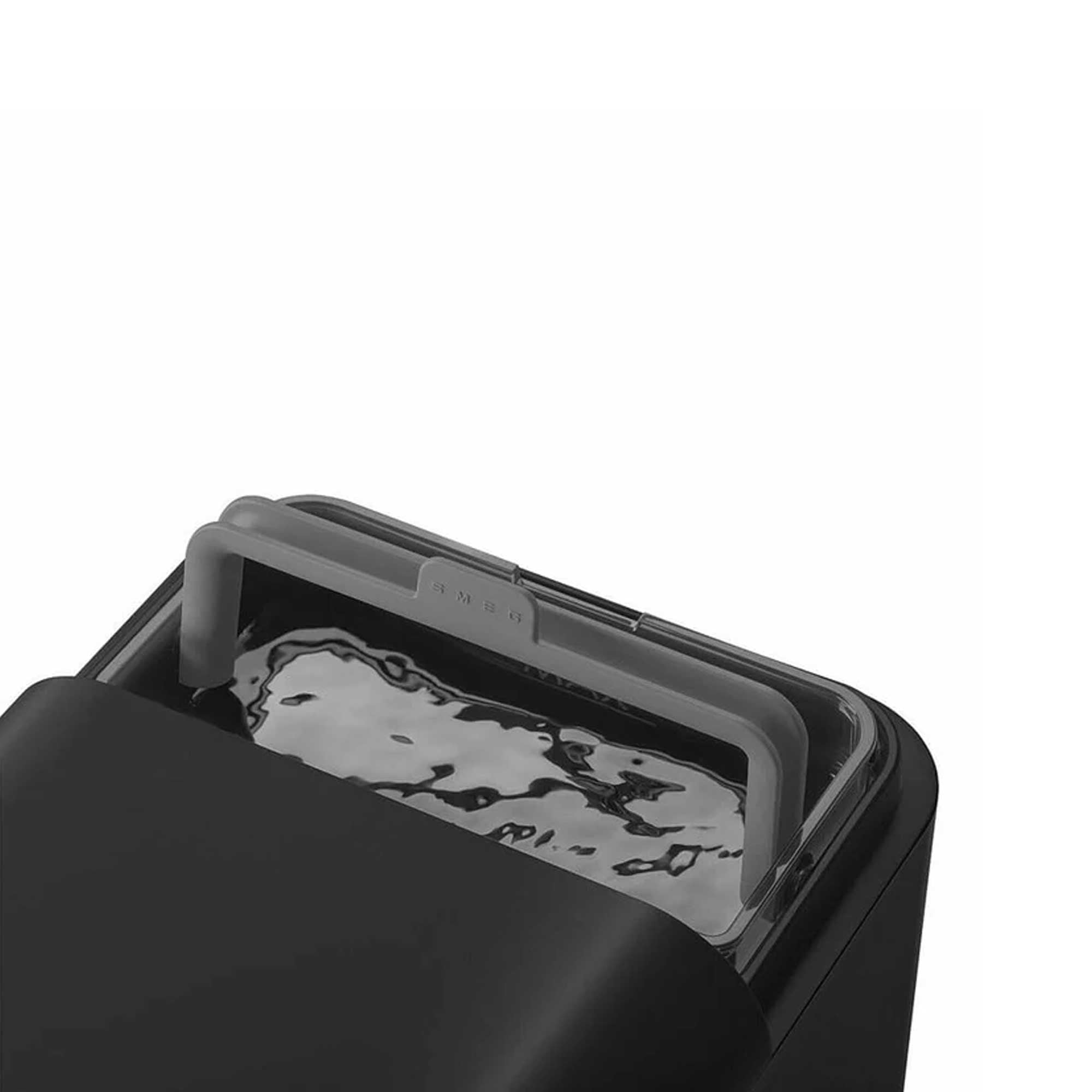 Smeg coffee water container with a handle showing Smeg logo