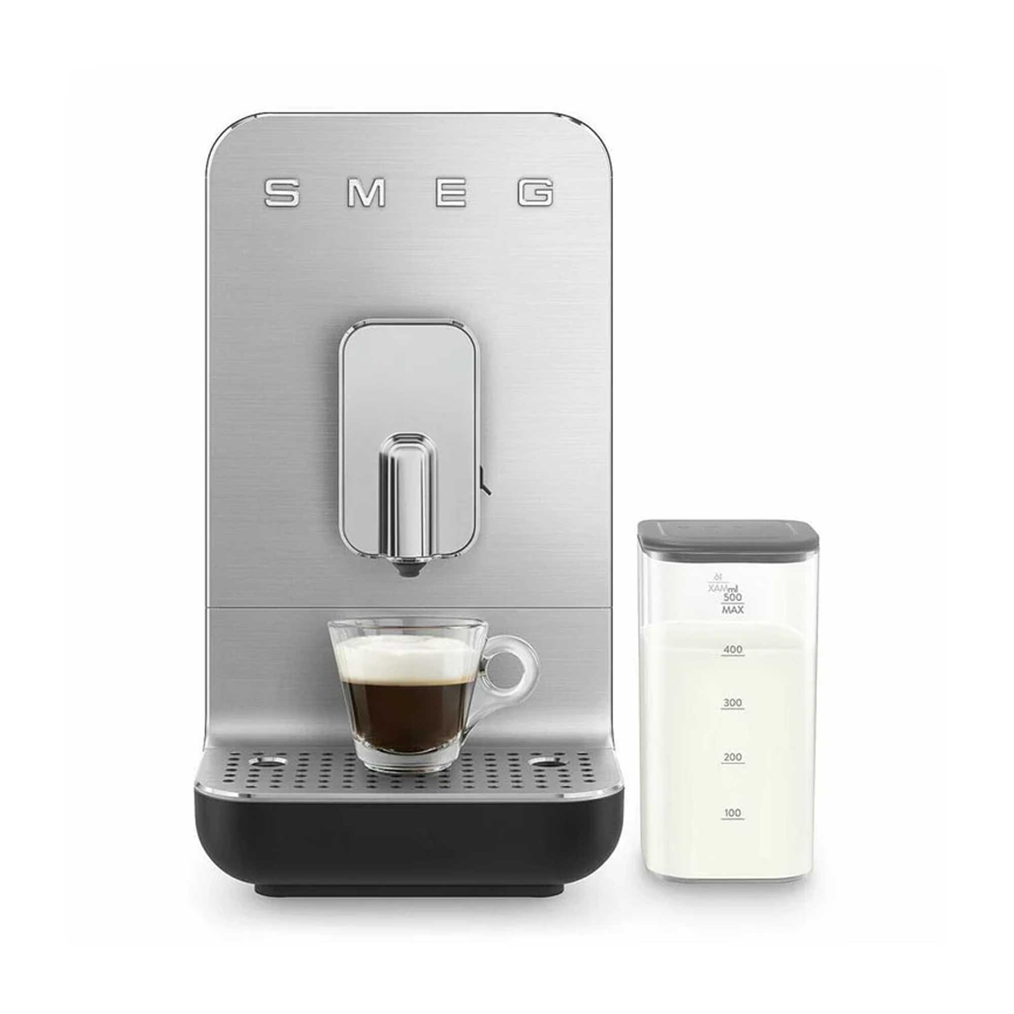 SMEG coffee machine with a cup of coffee and milk container on a white background