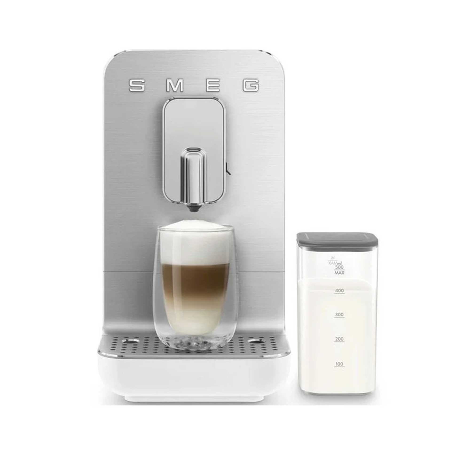 SMEG coffee machine with a cup of coffee and milk pitcher on a white background