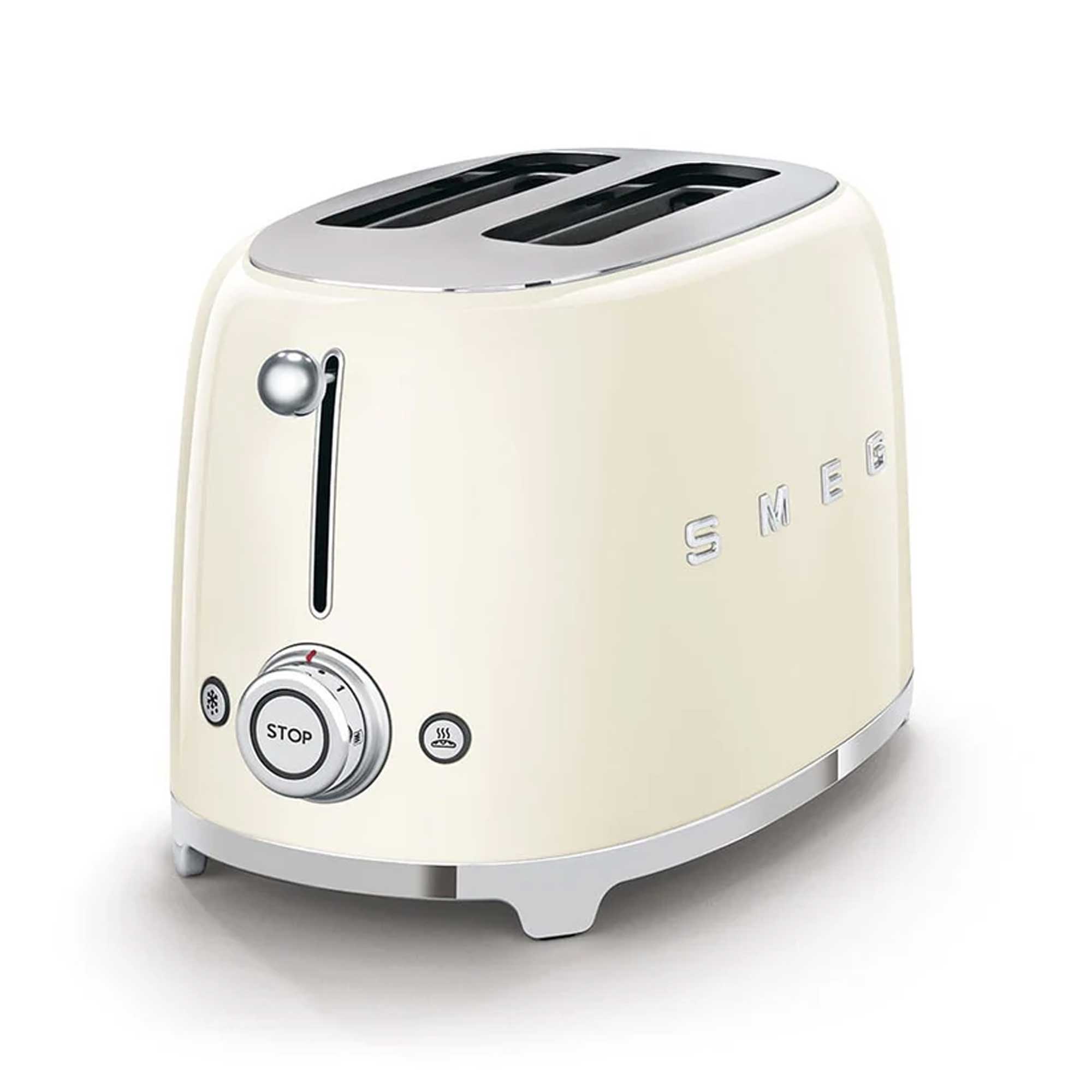 Cream-colored toaster with metallic accents on a white background