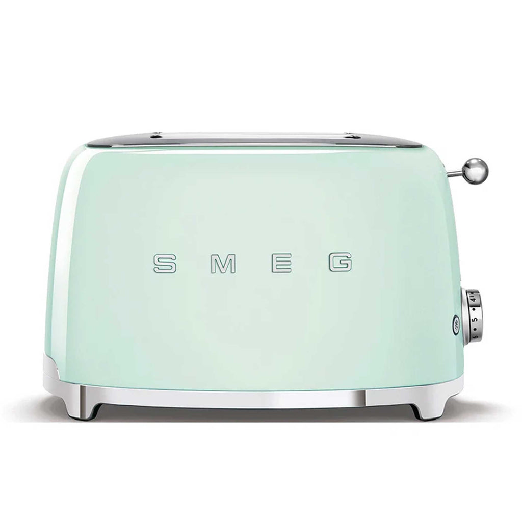Pastel green toaster with 'SMEG' branding on a white background