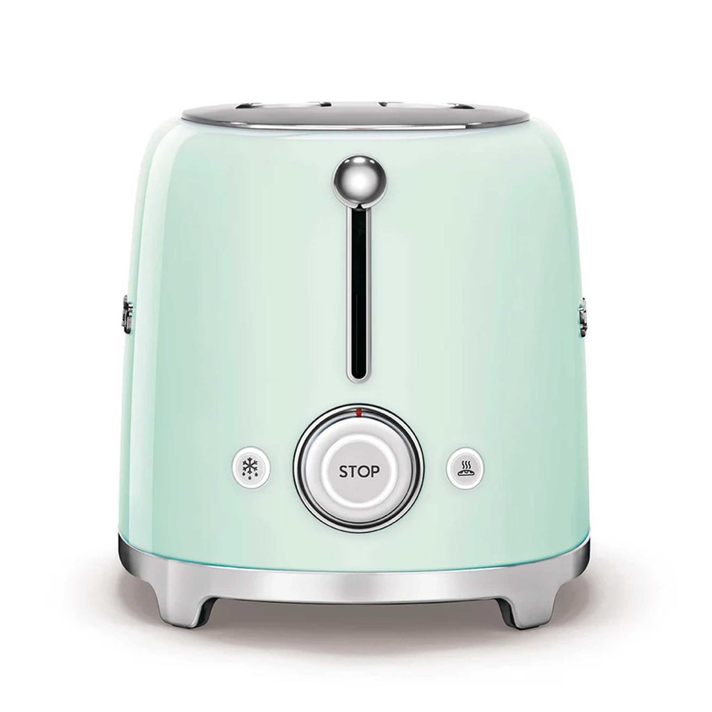 Pastel green toaster on white background showing the controls