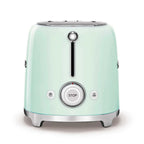 Pastel green toaster on white background showing the controls
