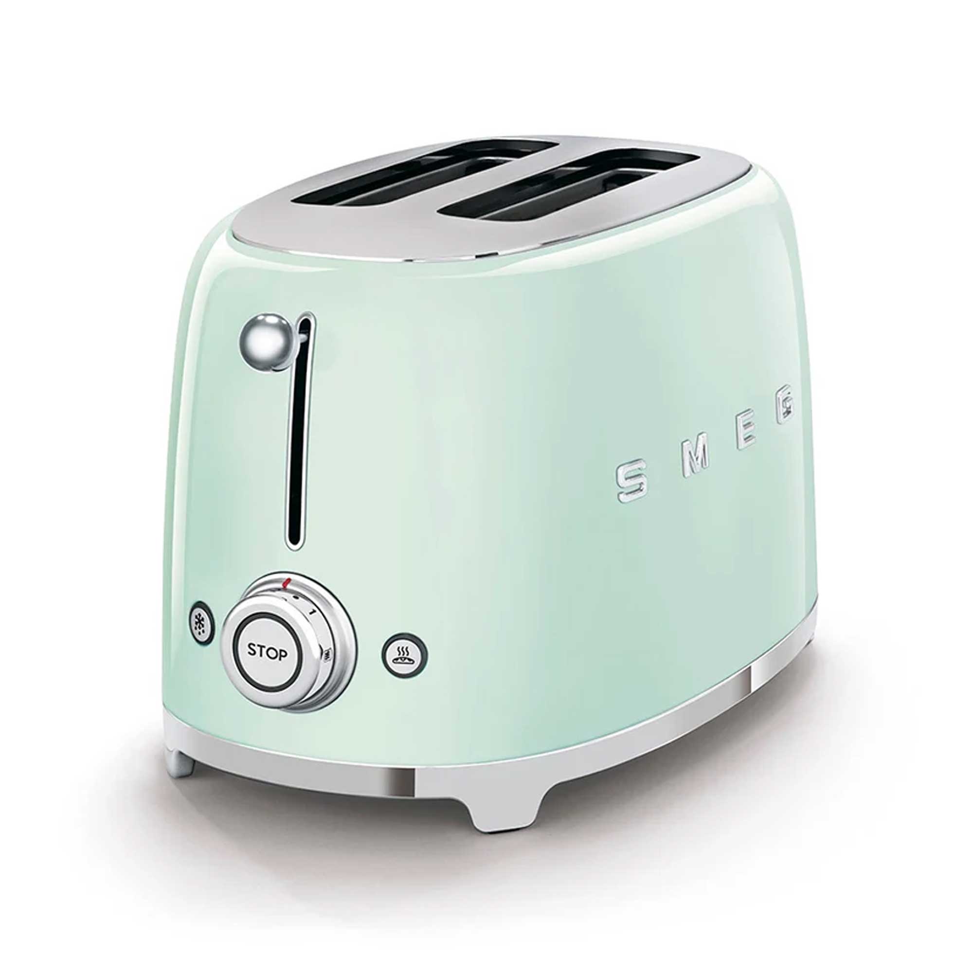 Pastel green toaster on white background