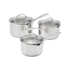 Three stainless steel saucepans with glass lids, arranged in a set on a plain white background.