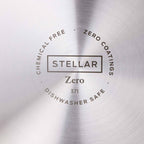 Close-up of a brushed metallic surface with a circular printed label reading 'STELLAR Zero 371' and surrounding text 'CHEMICAL FREE', 'ZERO COATINGS', and 'DISHWASHER SAFE'.