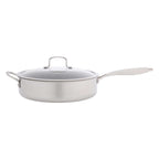 Stainless steel saute pan with a glass lid on a white background