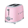 Pink toaster with silver accents on a white background