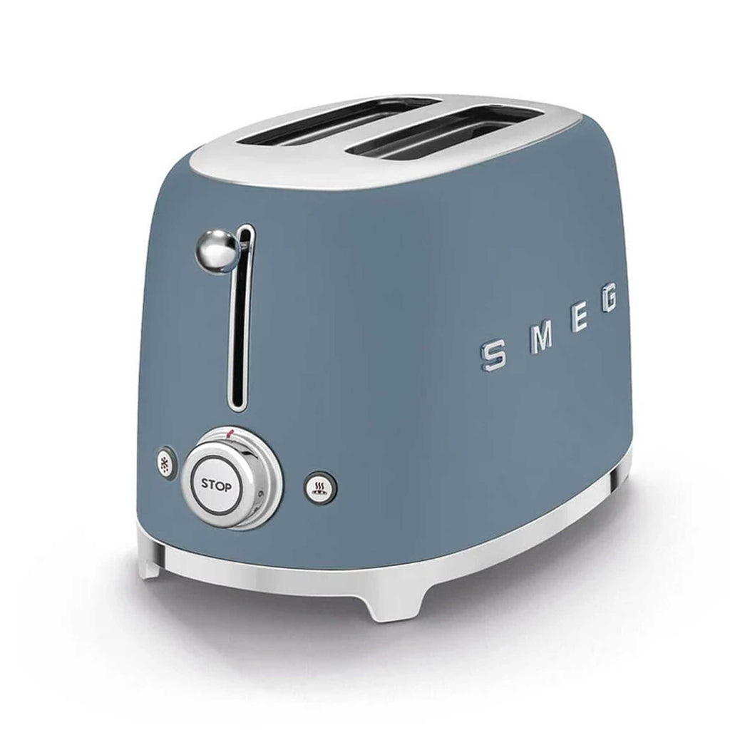 Blue Smeg toaster on a white background
