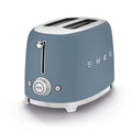 Blue Smeg toaster on a white background