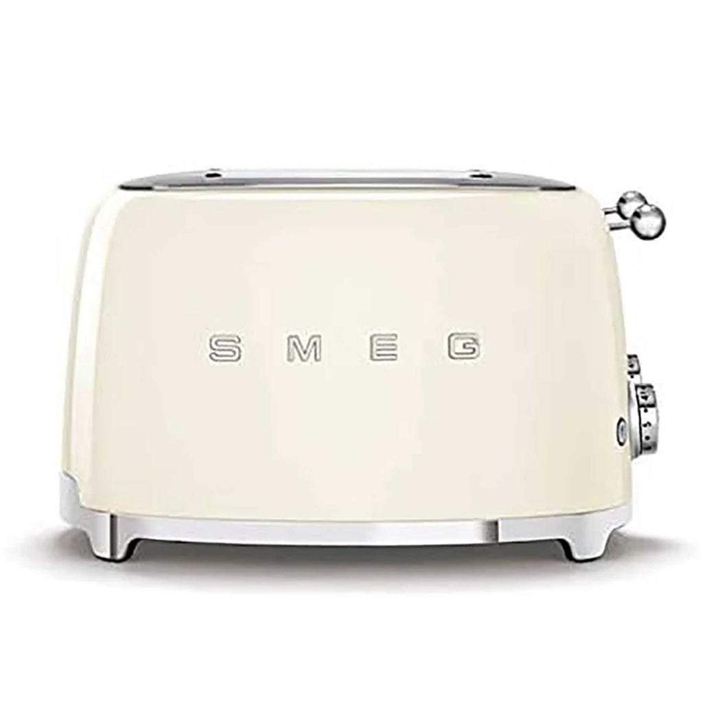 Cream-colored toaster with 'SMEG' branding on a white background