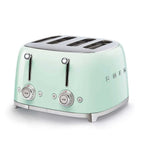 Pastel green toaster with silver accents on a white background
