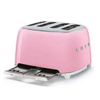Pink toaster with 'Smeg' branding on a white background
