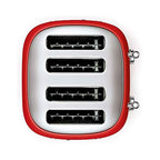 Red toaster showing bread slots on a white background