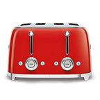Red toaster with silver knobs on a white background