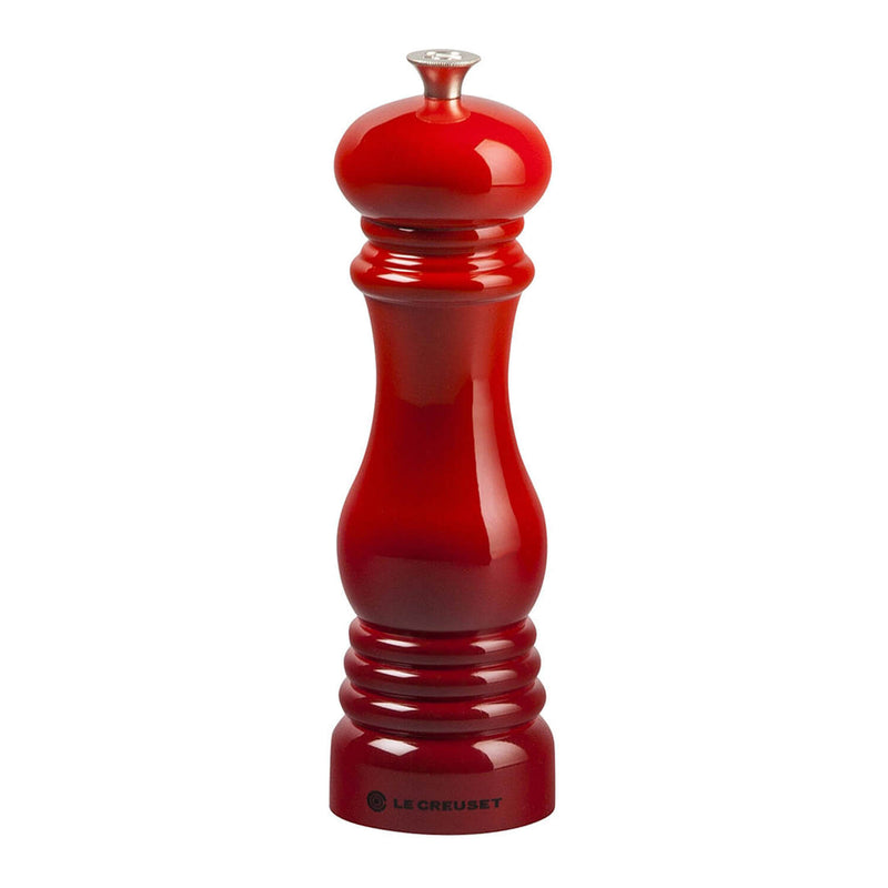 Cerise pepper grinder on a white background