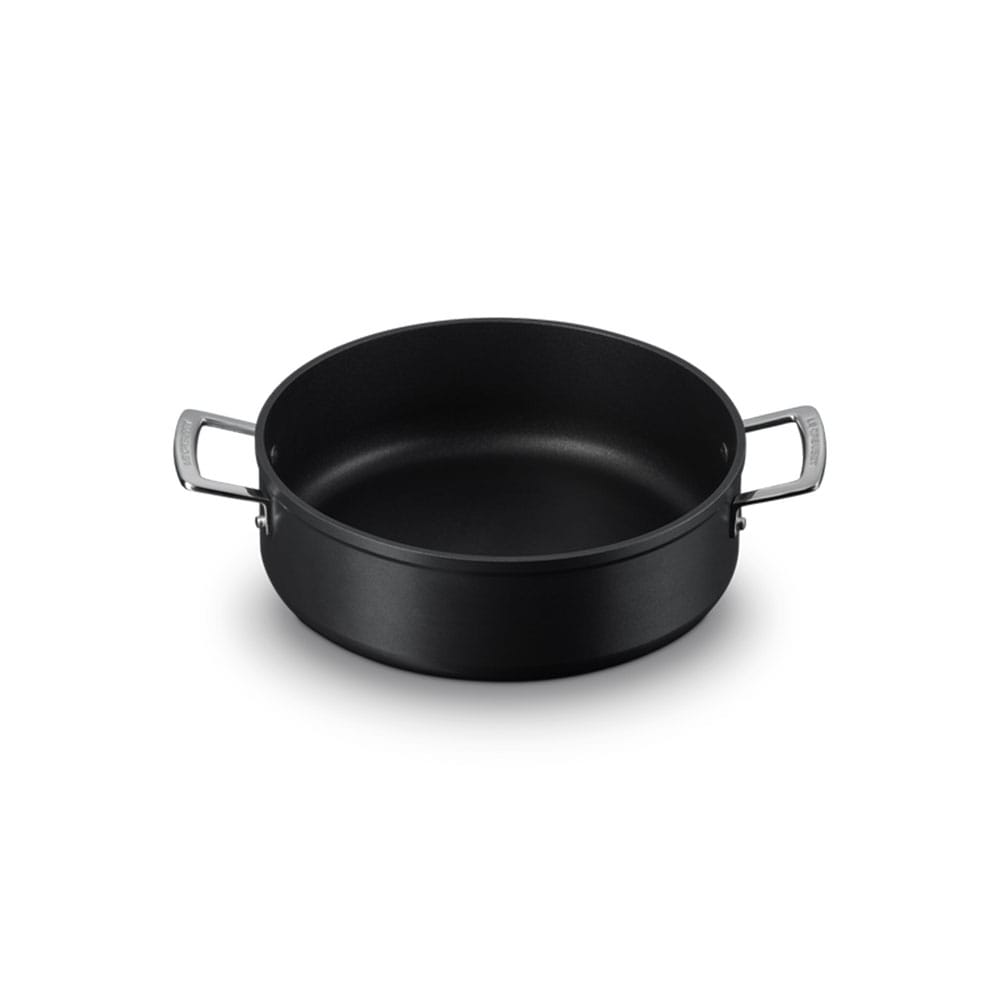 Black sauteuse with handles on a white background