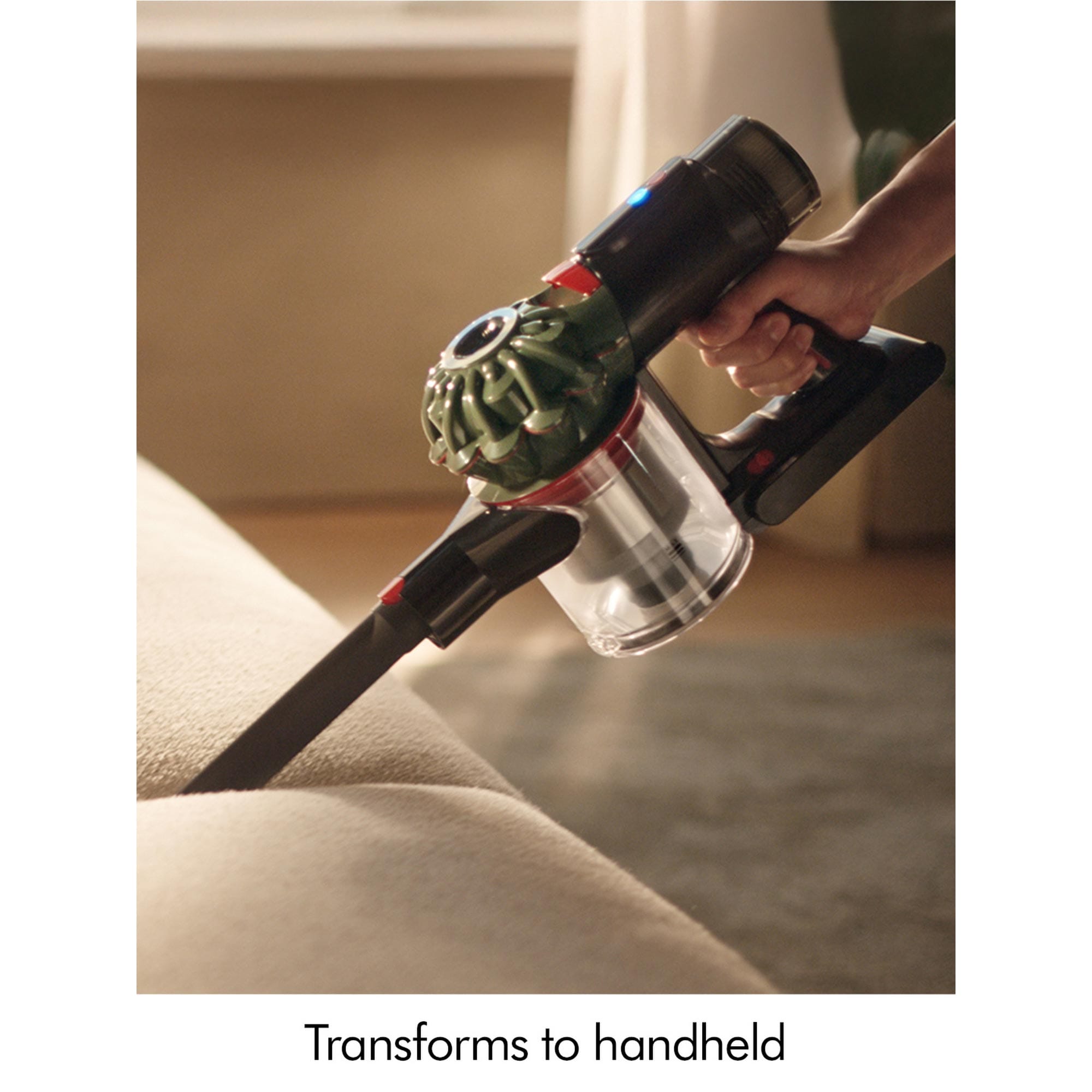 Transforms into a handheld vacuum cleaner.