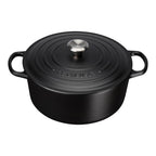 Le Creuset Satin Black casserole with Le Creuset logo on a white background