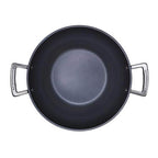 Black wok with silver handles on a white background