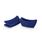 Two blue silicone baking molds on a white background