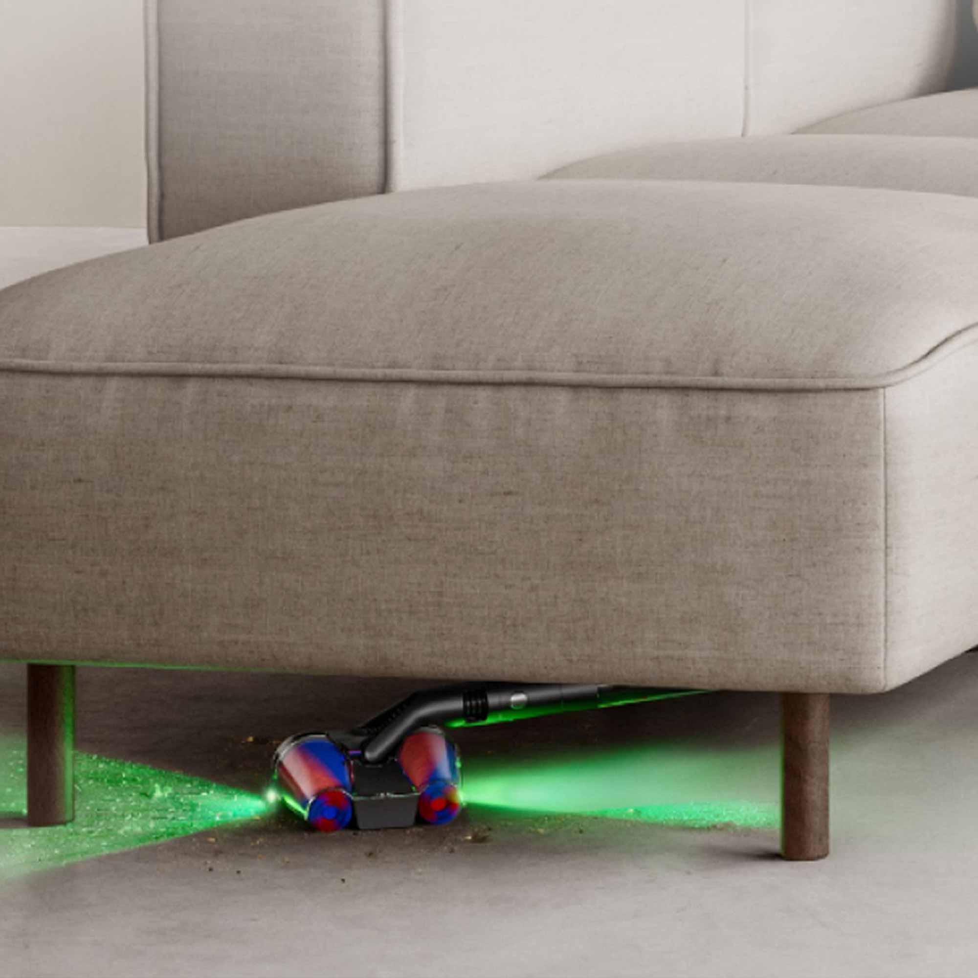 The PencilVac can be laid flat to fit under furniture and vacuum hidden dirt.
